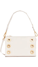 Load image into Gallery viewer, An off-white leather shoulder bag with gold-tone grommet details and a matching shoulder strap, shown against a plain white background.
