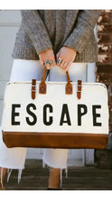 Load image into Gallery viewer, ESCAPE text on ivory duffle bag with leather details
