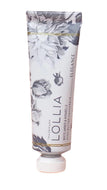 A tube of LOLLIA petite handcream with a floral design on the packaging.